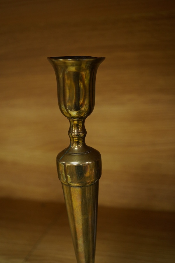 Four items of metalware comprising a candlestick, door knocker, tray and kettle, largest 26cm high